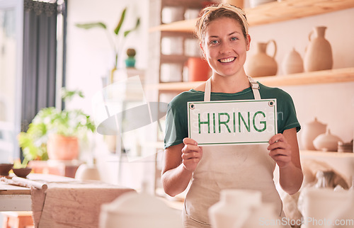 Image of Hiring sign, woman and small business owner in portrait for shop recruitment, retail job advertising and career manager. Boss, person or employer with hand holding message for onboarding opportunity