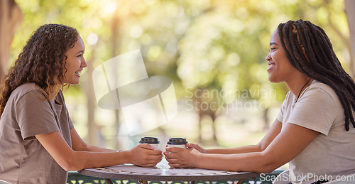Image of Woman, friends and conversation with coffee at cafe for social life, catchup or communication outside. Happy women enjoying friendly discussion, talk or gossip together in friendship at coffee shop