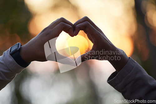 Image of Heart hands, closeup and outdoor for love, support and partnership for marriage, anniversary and commitment. Romance, couple and gesture for bonding, dating and romantic together and relationship