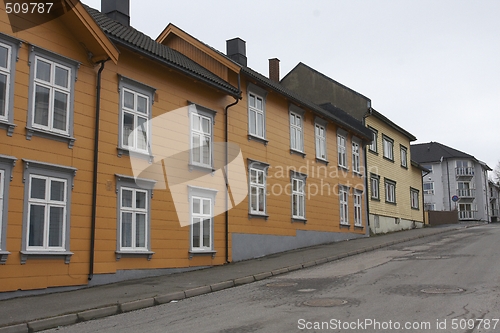 Image of Yellow wooden house.