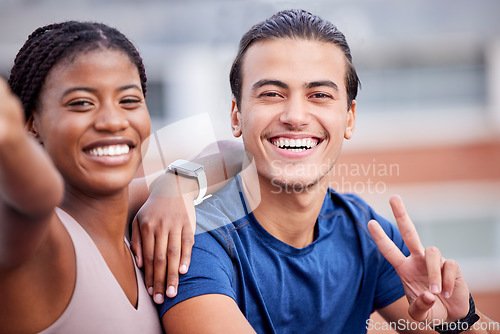 Image of Fitness, portrait or friends take a selfie with peace emoji in training, workout or exercise break to relax. Gym, black woman and personal trainer take pictures with a happy smile for social media