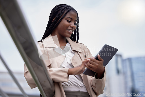 Image of Business tablet, street and black woman in city, internet browsing or research. Technology, employee and happy female with touchscreen for reading email, networking or social media in town outdoors.