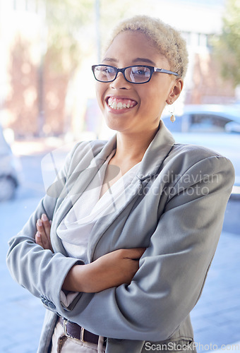 Image of Business, black woman and arms crossed in city, smile or confident girl, startup or leadership. African American female employee, entrepreneur outdoor or gesture for leader, corporate deal or success