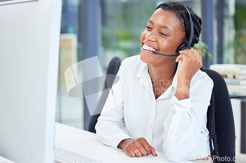 Image of Black woman, call center and smile for telemarketing, customer service or support by computer at the office. Happy African American female consultant in communication or contact us for online advice