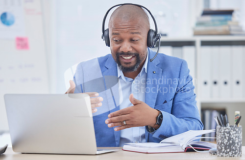 Image of Black man, laptop and consulting on video call for telemarketing, meeting or business idea at the office. African American male consultant in communication on computer for strategy or project plan