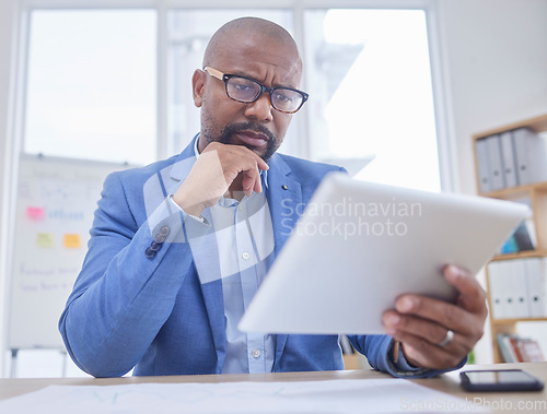 Image of Black man, tablet and serious thinking face in office for web design, online communication or reading tech email in office. African businessman, digital search or boss planning strategy on device