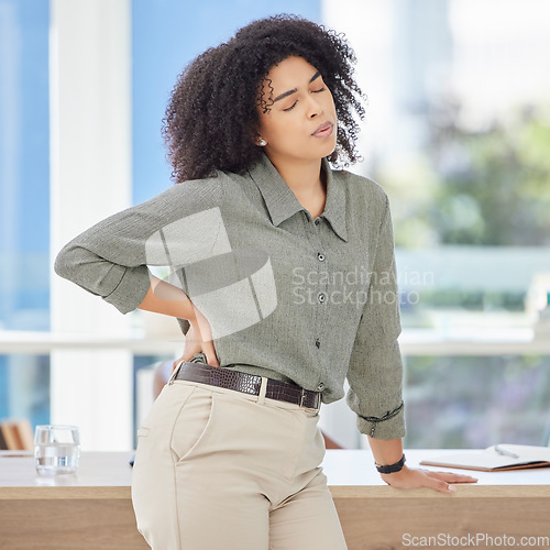 Image of Business, back pain and black woman with stress, burnout and fatigue in office, muscle strain and overworked. African American female employee, entrepreneur or leader with healthcare issue and injury