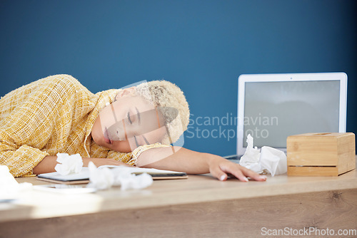 Image of Work, covid and woman at desk sleeping with tissue paper and laptop, tired and overworked from flu or cold. Sick, exhausted and sleep, office employee health risk with illness, burnout or insomnia.