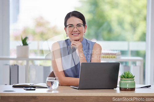 Image of Portrait, leadership and happy woman at her desk for email management, planning schedule and company goals. Vision, mission and laptop of Human Resources manager, corporate person or worker in office