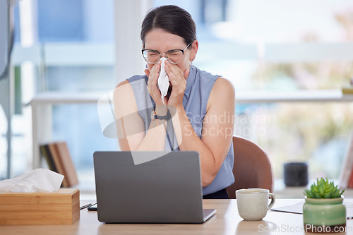 Image of Business woman, sick and nose tissue for cold virus or allergy problem at work with laptop. Entrepreneur person with flu or sinus while working with health risk at a corporate company office desk