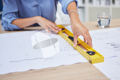 Image of Architect, woman and blueprint with hands of an engineer drawing plan on paper for property development. Designer at her office desk for project management, building architecture and engineering