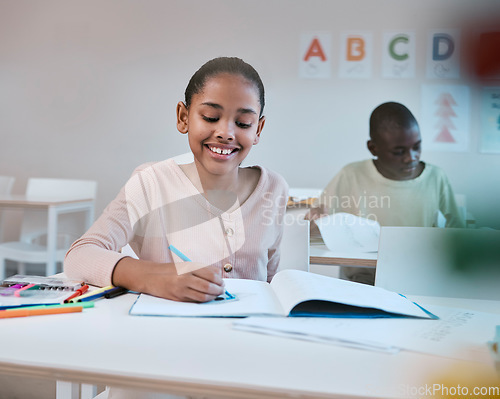 Image of Education, smile and child in classroom learning reading, writing and math in Montessori school in New York. Books, students and happy girl at kid desk in class with notebook studying for future exam