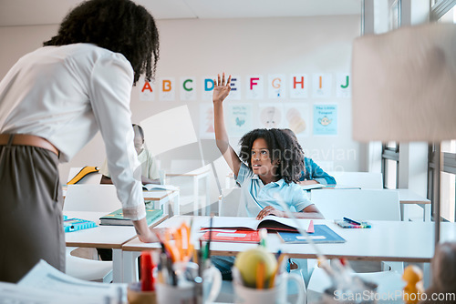 Image of Question, school and education with a black girl student hand raised in a classroom to ask or answer her teacher. Kids, asking and learning with a young female child in class to study for growth