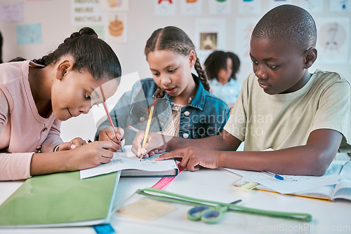 Image of Teamwork, education, and group of children in classroom working together on project in Montessori school. Books, help and diversity, young students writing or drawing in notebook for fun art homework