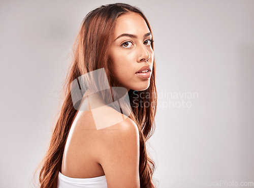 Image of Face, mockup and woman with hair in portrait, beauty and skin with glow and shine isolated on studio background. Hairstyle, cosmetic skincare and wellness with keratin treatment and styling