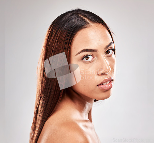 Image of Portrait, woman and face of beauty or skincare model with natural skin isolated against a studio grey background. Cosmetic, head and girl from Rio De Janeiro with facial treatment for a smooth glow