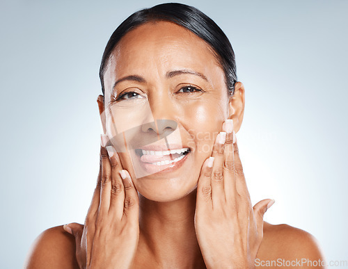 Image of Face, beauty skincare and woman with tongue out in studio isolated on a gray background. Portrait, makeup cosmetics and happy senior female model satisfied with spa facial treatment for healthy skin.