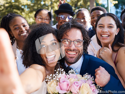 Image of Friends, bride and groom with wedding selfie for outdoor ceremony celebration of happiness, love and joy. Marriage, happy and interracial relationship photograph of togetherness with excited guests