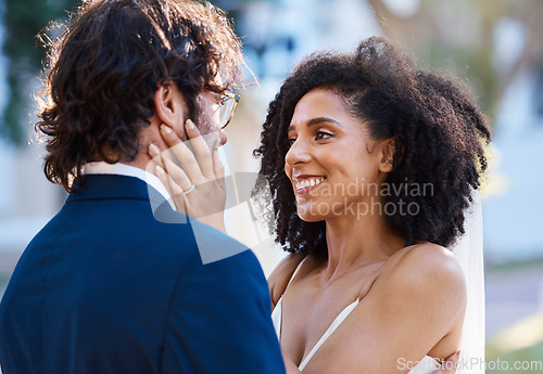 Image of Interracial couple wedding, black woman and man with excited smile, happiness or future together. African bride, husband and diversity at outdoor marriage for love, embrace or eye contact in sunshine