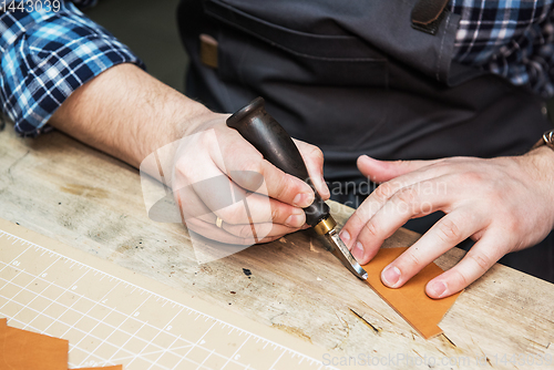 Image of Concept of handmade craft production of leather goods.