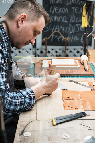 Image of Concept of handmade craft production of leather goods.