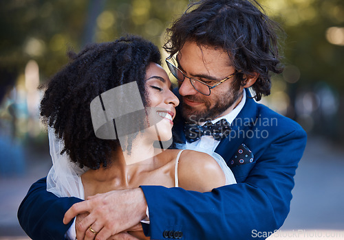 Image of Wedding, couple hug and marriage outdoor with commitment, trust and love with bride and groom in park. Happiness, life partner with married man and black woman, interracial relationship and smile