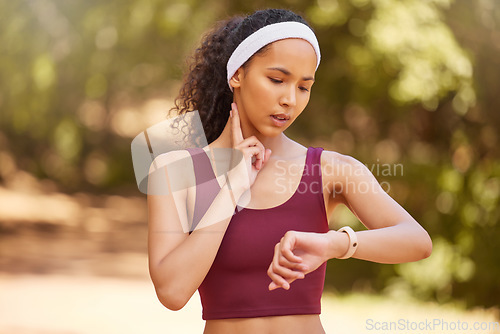 Image of Tired, time and woman with pulse check in nature for fitness, training motivation and steps in Argentina. Sports, health and athlete runner with watch for a forest workout, heart cardio and exercise