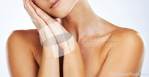 Image of Beauty, skincare and body of woman in studio for natural skin glow cosmetic product. Aesthetic model person with hands for dermatology, wellness and self care with spa treatment results and benefits