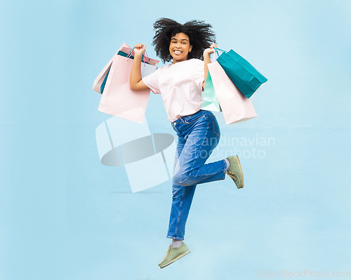 Image of Happy, shopping and jump with portrait of black woman for spree, sale and summer discount. Retail therapy, spending and consumer deal with girl customer and bag for designer, products and purchase