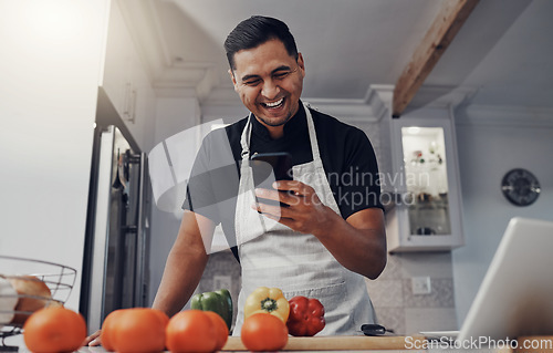 Image of Man, cooking vegetables and phone for comic online recipe in kitchen with house wifi connection. Chef person with mobile app for learning or blog post for home food for vegan or healthy eating