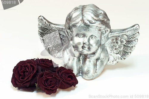 Image of Silver cupid with roses