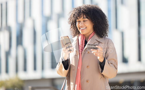 Image of Phone, online shopping or black woman with credit card for payment, internet purchase or ecommerce in London street. Fintech, happy or employee for trading, banking or investment with smile in city