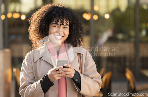 Image of Travel, portrait or black woman with phone for networking, social media or communication in London street. Search, happy or professional on smartphone for research, internet or blog content outdoor