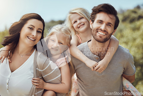 Image of Park, piggyback and portrait of parents with children enjoying quality time in nature, holiday and weekend. Family, love and happy kids, mom and dad smile for bonding, relax and adventure outdoors