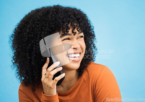 Image of Laughing black woman, face and phone call by isolated blue background in funny gossip, news and comic story. Smile, afro and happy person talking on mobile communication technology by wall mock up