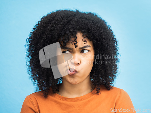 Image of Thinking, confused and black woman in studio for emoji, contemplating and thought on blue background. Girl, doubt and model unsure, confusion and contemplation, idea and decision while isolated