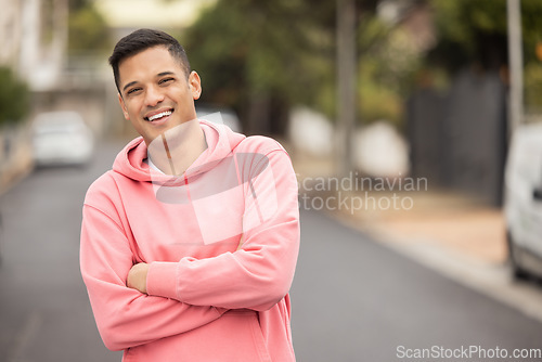 Image of Portrait, happy and man in a street for travel, explore and proud against a blurred background. Face, smile and handsome male posing in a city, excited and cheerful about vacation trip in Mexico