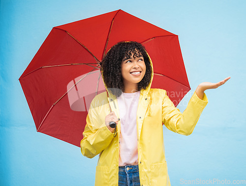 Image of Travel, rain and woman with umbrella in a city, having fun and solo trip on wall background. Weather, hand and girl traveler enjoying rainfall, touching and excited, feeling and standing isolated