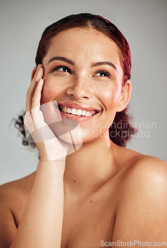 Image of Skincare, wellness and woman with makeup in studio with cosmetic, beauty or natural face routine. Happy, smile and female model with healthy or self care facial treatment isolated by gray background.