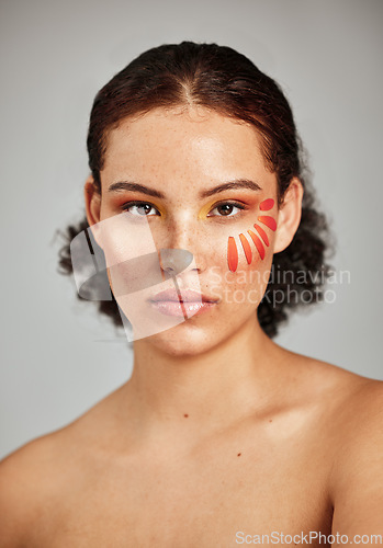 Image of Flower petal, beauty and makeup portrait of a woman in studio for natural face and skincare. Facial cosmetic, wellness and self care for skin glow, floral sustainability and dermatology of person