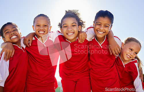 Image of Group portrait, girl football and field with smile, team building motivation or solidarity at sport training. Female kids, sports diversity and happy with friends, teamwork or development for soccer