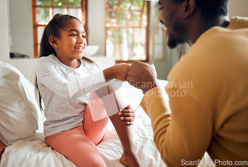 Image of Black family, father and girl fist bump for love, bonding or care in bedroom. Hands gesture, unity and happy kid and man with fists sign for support, union or trust, solidarity and affection in house