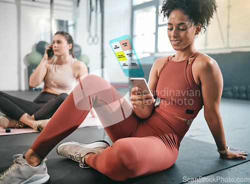 Image of Fitness, phone or black woman on social media at gym relaxing on a break after workout. Girl, overlay or healthy sports athlete resting, scrolling on app after training with alert or notification