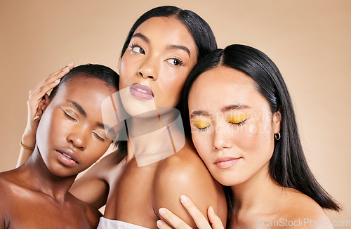 Image of Women support, makeup and face dermatology for skincare wellness, cosmetics beauty and closed eyes in brown background studio. Young model, diversity and luxury spa treatment for natural glowing skin