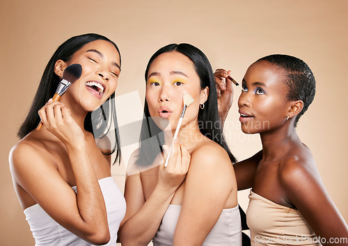 Image of Beauty, makeup tools and women face skincare wellness, cosmetics dermatology and happiness in brown background studio. Diversity, young models laugh and group spa products for natural glowing skin