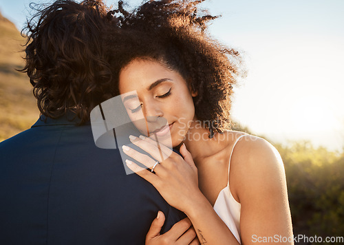 Image of Wedding, bride and groom hug at sunset with embrace together for care, love and support in married life. Marriage, black woman and man at romantic marriage event in Cape Town, South Africa nature.