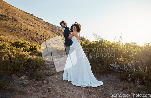 Image of Love, wedding or a couple of friends in countryside after a romantic celebration in an interracial marriage. Life partner, black woman and happy man enjoy a peaceful memory walking as bride and groom