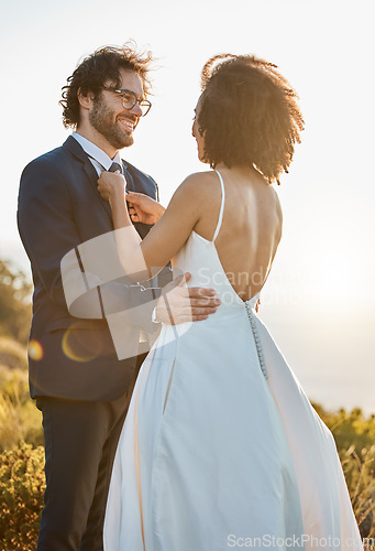 Image of Wedding, nature and couple on mountain for marriage ceremony, commitment and celebration. Trust, love and interracial bride and groom loving, happy and smile ready for romance, bonding and affection