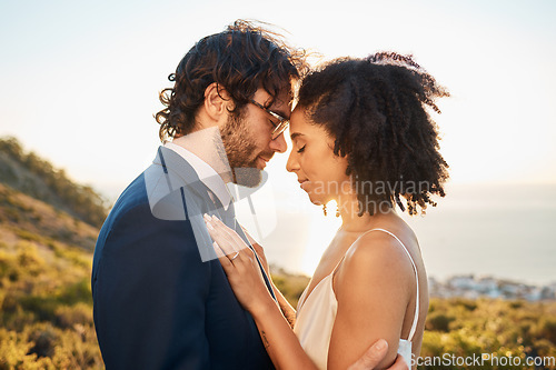 Image of Wedding, interracial couple love and worship of people outdoor for marriage and save the date. Close, celebration and bride with man for commitment, care together feeling calm in nature