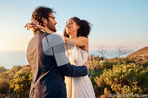 Image of Love, wedding and bride with groom smile on mountain for marriage ceremony, commitment and celebration. Trust, happy and interracial couple relax on romantic holiday, honeymoon and vacation by ocean